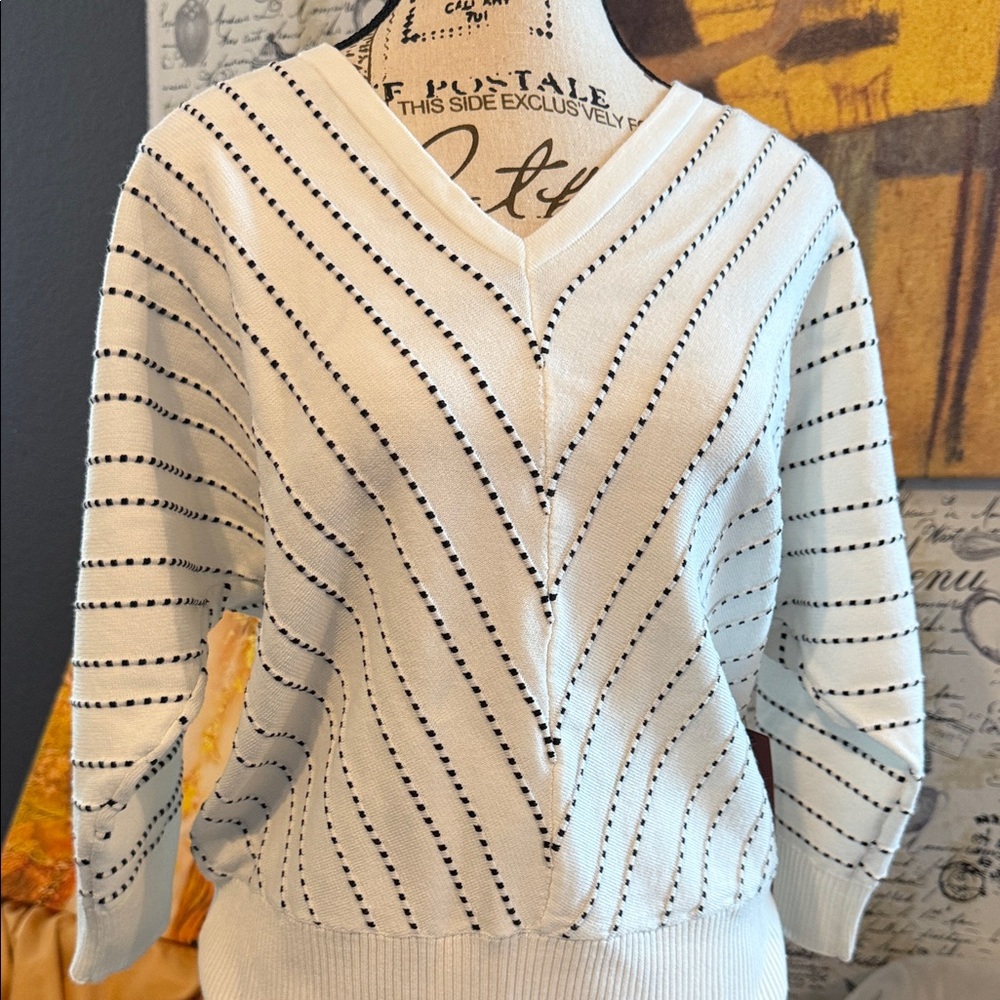 Elegant V-Neck Sweater with Black Stripes